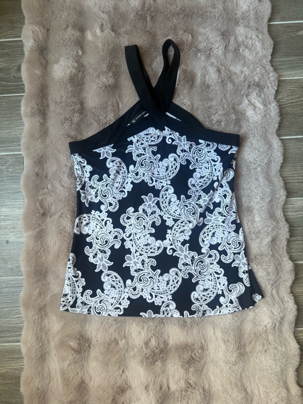 Black and white INC tank top with criss cross straps, size medium